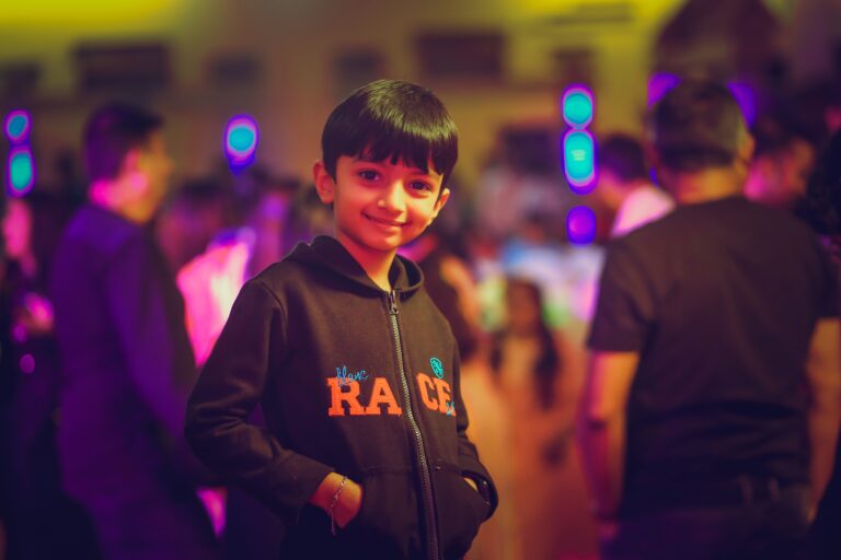 Professional birthday photography scene with a focus on capturing special moments and decorations. Best photographer in Karachi, Birthday photographer in Karachi. Teenage boy enjoying a party with friends.